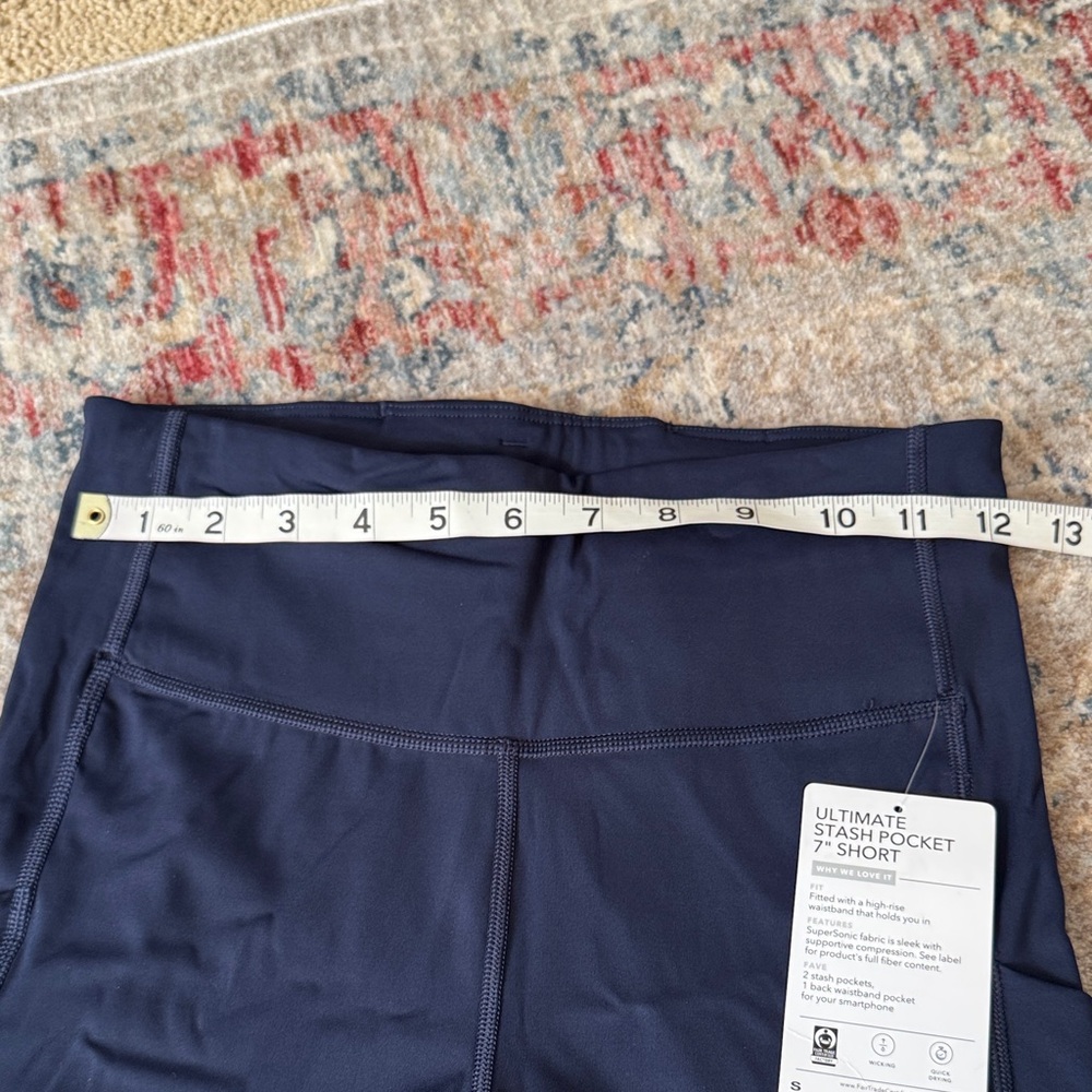 Athleta ultimate stash 7” pocket Navy High-Waisted Shorts - Picture 5 of 9